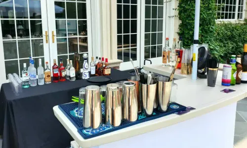 Premium mobile bartending setup with a custom shopping list calculation guide for parties